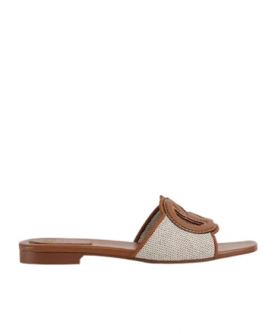 Gucci Gg Interlocking Slide Sandal In Brown