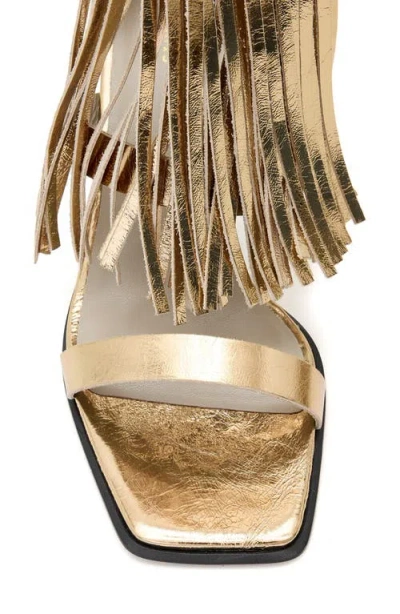 Allsaints Paola Met Leather Fringe Heeled Sandals In Gold