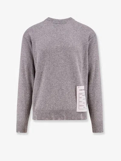 AMARANTO WOOL AND CASHMERE SWEATER WITH LOGOED LABEL 