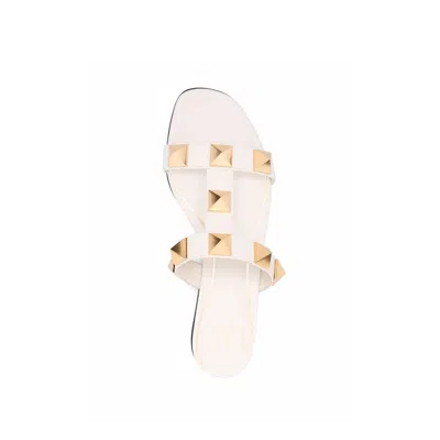Valentino Garavani Roman Stud Flat Sandals With Signature Pyramid Studs In White