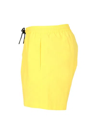 Msgm Logo-print Drawstring Swim Shorts In Yellow