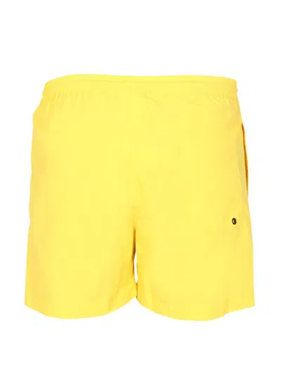 Msgm Logo-print Drawstring Swim Shorts In Yellow
