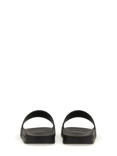 Givenchy Black Flat Slides With Logo In Polyurethane Man In Black