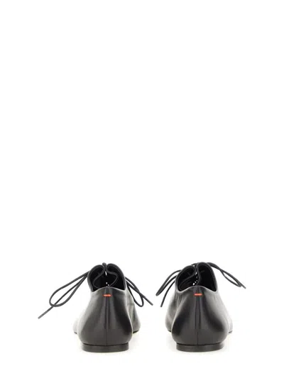 Aeyde Pointed Toe Nappa Leather Flats In Black