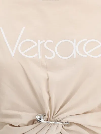 Versace Cropped T-shirt With Twist Detail And Safety Pin Logo In Pink