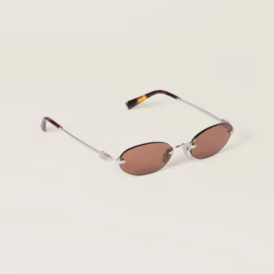 Miu Miu Sunglasses In Brown