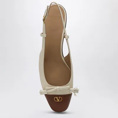Valentino Garavani 'valet Du Roi' White Ballet Flats With Vlogo Plaque On The Front And Adjustable L In Beige