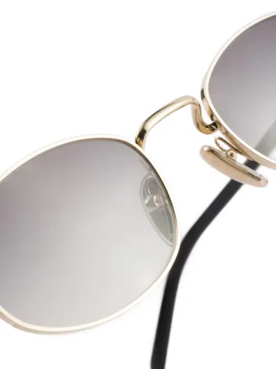 Prada Sunglasses With The Iconic Metal Plaque In Gold