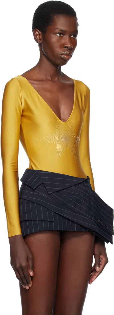 Pushbutton Gold Star Point Bodysuit In Gold