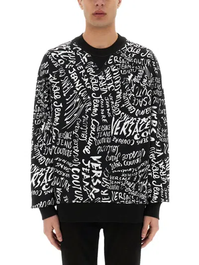Shop Versace Jeans Couture Sweatshirt With Logomania Print In Black