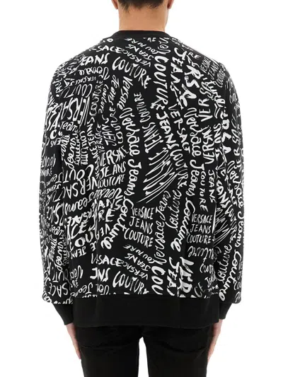 Shop Versace Jeans Couture Sweatshirt With Logomania Print In Black