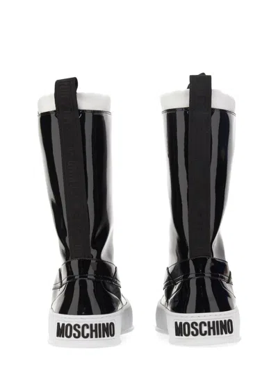 Moschino Glossy High-shaft Boots With Contrasting Sole In Black