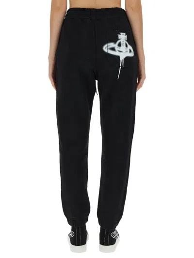 Vivienne Westwood Women Jogging Pants With Spray Print Orb In Black