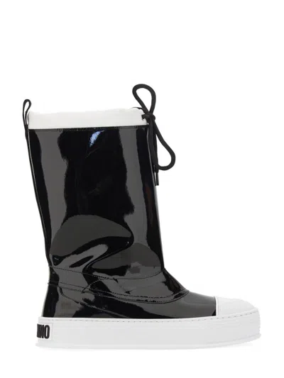 Moschino Glossy High-shaft Boots With Contrasting Sole In Black