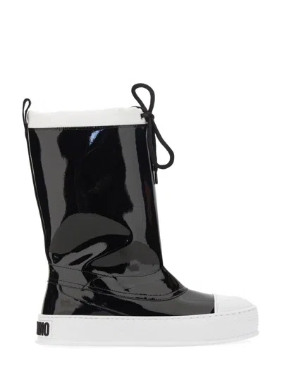 Moschino Glossy High-shaft Boots With Contrasting Sole In Black