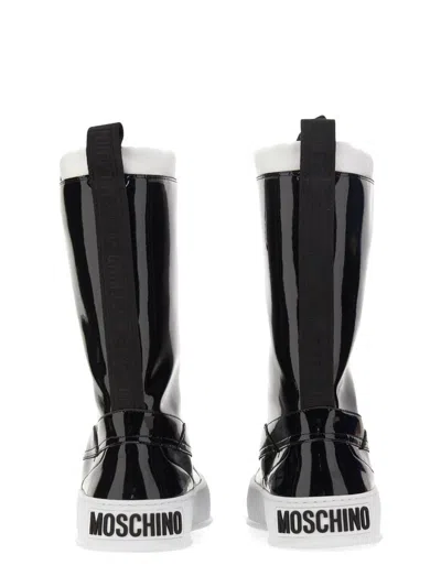 Moschino Glossy High-shaft Boots With Contrasting Sole In Black