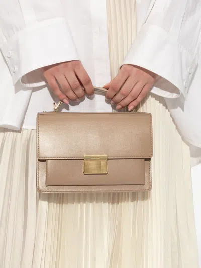 Golden Goose Deluxe Brand Structured Handbag With Gold-tone Clasp And Versatile Straps In Powder
