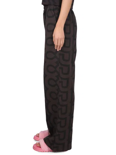 Marc Jacobs Monogram Printed Oversized Sweatpants In Brown