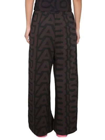Marc Jacobs Monogram Printed Oversized Sweatpants In Brown