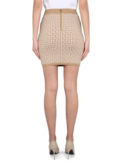 Shop Balmain Mini Skirt In Beige