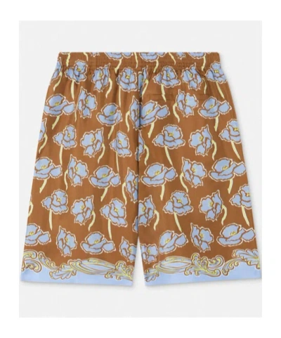 Versace Elastic Waistband Floral Print Shorts In 5n630 Print