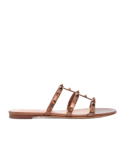 Valentino Rockstud Metallic City Flat Slide Sandals In Brown