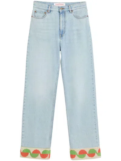 Valentino Garavani Light Blue Jeans With Logo Patch On The Back And Jacquard Cuffs In Denim Woman In Blue