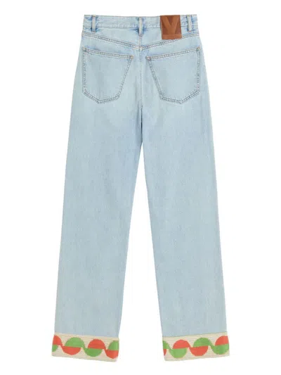 Valentino Garavani Light Blue Jeans With Logo Patch On The Back And Jacquard Cuffs In Denim Woman In Blue