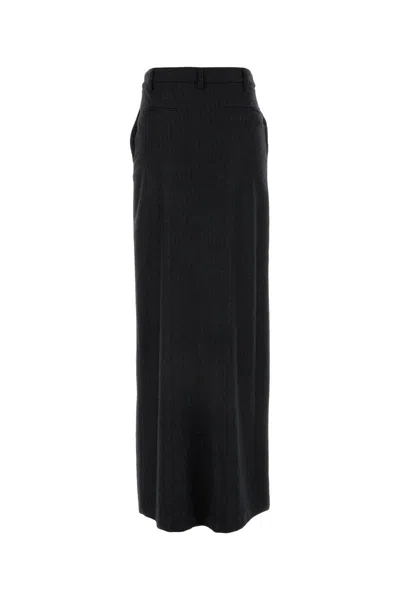 Le Sully Studio Pinstripe Midi Skirt In Black