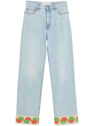 Valentino Garavani Light Blue Jeans With Logo Patch On The Back And Jacquard Cuffs In Denim Woman In Blue