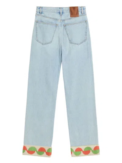Valentino Garavani Light Blue Jeans With Logo Patch On The Back And Jacquard Cuffs In Denim Woman In Blue