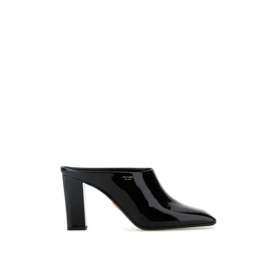 Prada Leather Block Heel Mules With Pointed Toe In Black