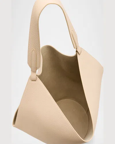 Khaite Lotus Medium Pebbled Leather Tote Bag In Dark Ivory