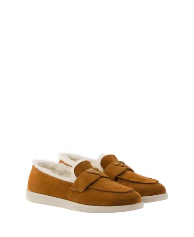 Prada St Tropez Suede Shearling Loafers In Cognac