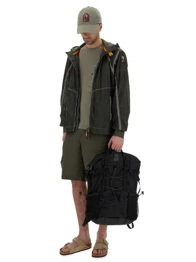 Parajumpers Edge Green Jacket With Logo Patch On The Sleeve And Shoulder Straps On The Back In Tech Fabric Man In Military Green