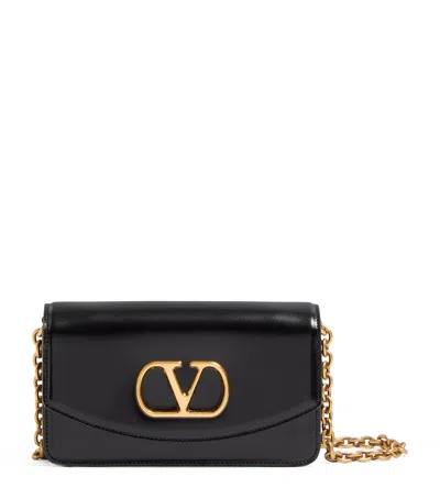 Valentino Garavani Vain Small Vlogo Leather Clutch Bag In Black