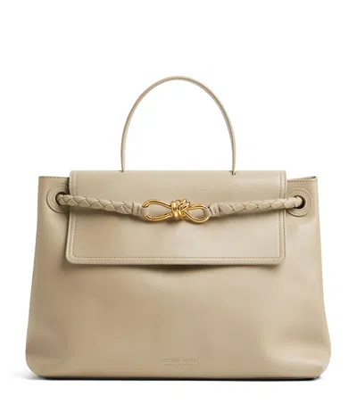 Bottega Veneta Ciao Ciao Knot Detail Leather Top Handle Bag In Neutral