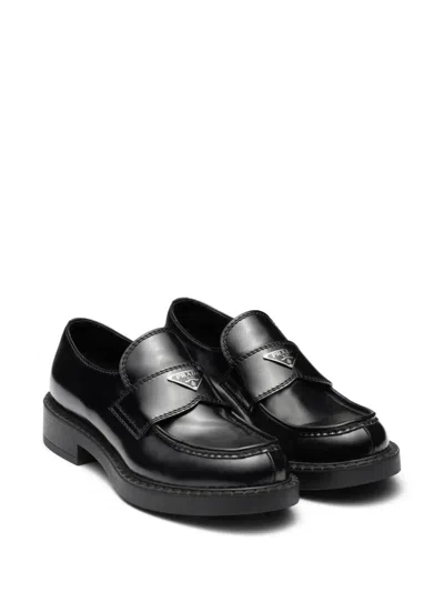 Prada Triangle Logo Chocolate Brushed Leather Loafers In Black