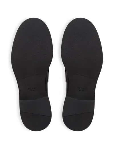 Prada Triangle Logo Chocolate Brushed Leather Loafers In Black