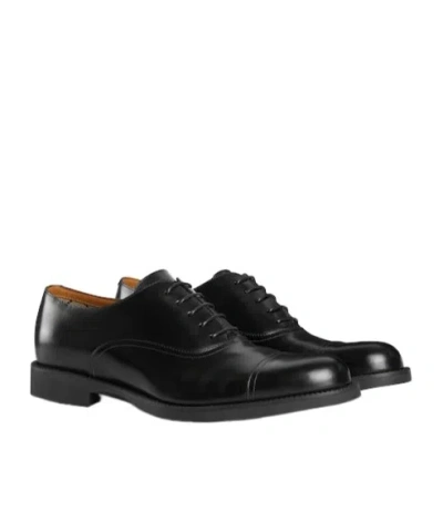 Gucci Interlocking G Leather Lace-up Shoes In Black