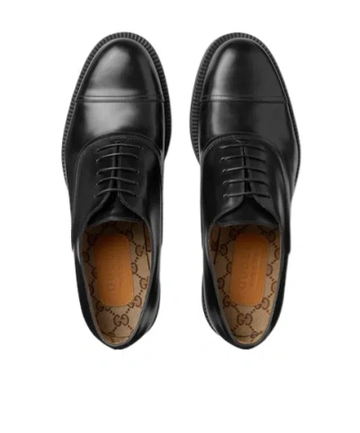 Gucci Interlocking G Leather Lace-up Shoes In Black