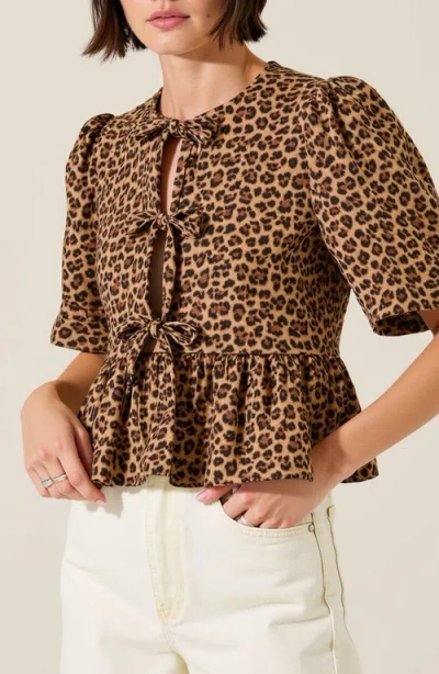 Modenaire Peplum Top With Front Tie Closures And Short Puff Sleeves In Leopard Print