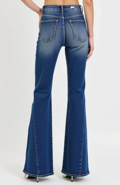 Modenaire High Rise Flare Jeans With Button Fly And Distressed Detail In Deep Indigo