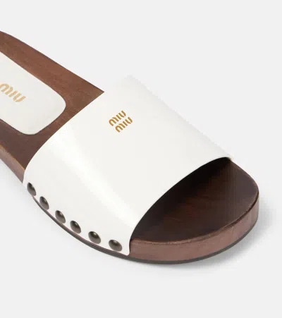 Miu Miu Wood Sole Flat Sandals With Studded Side In White