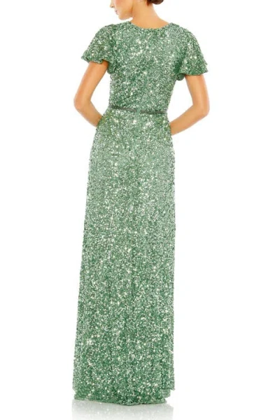 Mac Duggal Sequined Wrap Over Butterfly Sleeve Draped Gown In Sage