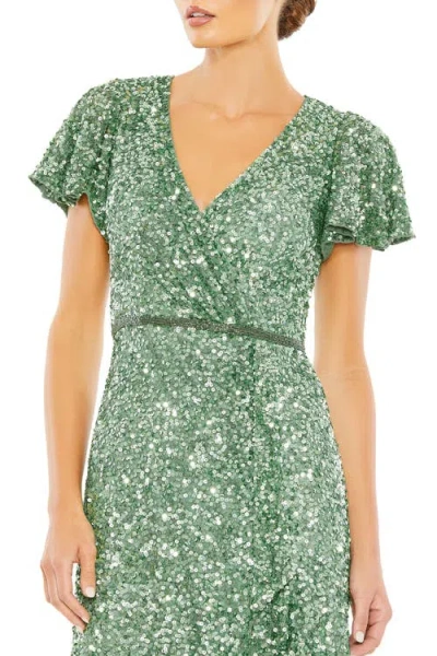 Mac Duggal Sequined Wrap Over Butterfly Sleeve Draped Gown In Sage