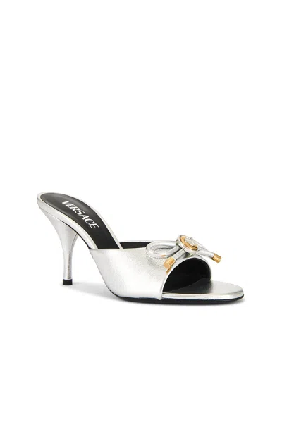 Versace Opera Bow 85 Metallic Leather Mules In Silver
