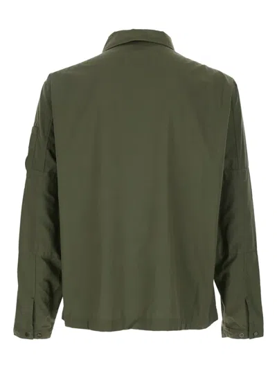 C.p. Company Green Jacket With Classic Collar And Logo Patch On The Sleeve In Green