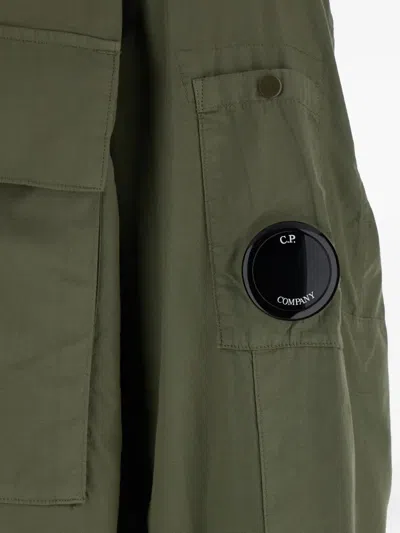 C.p. Company Green Jacket With Classic Collar And Logo Patch On The Sleeve In Green