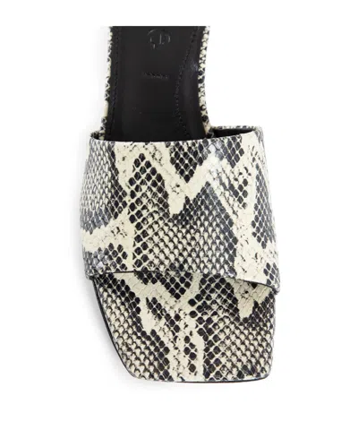 Aeyde Mules In Black And Cream